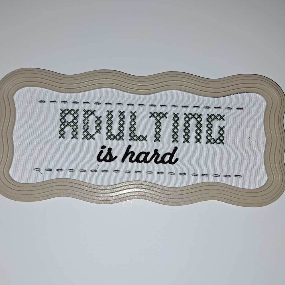 Decorative Sign with 'Adulting is Hard' Text